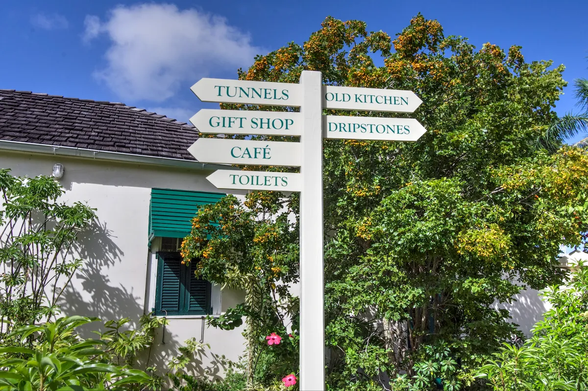 Signposts to coffee and gift shop