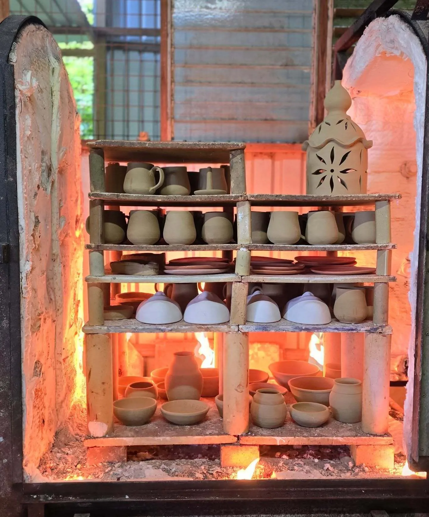 Pots going into kiln
